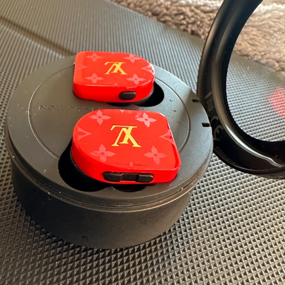 Used Louis Vuitton earbuds